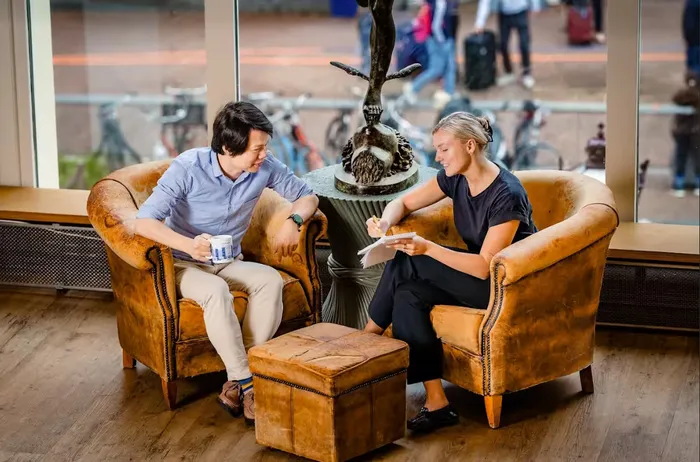 A team of employees working together in an office.